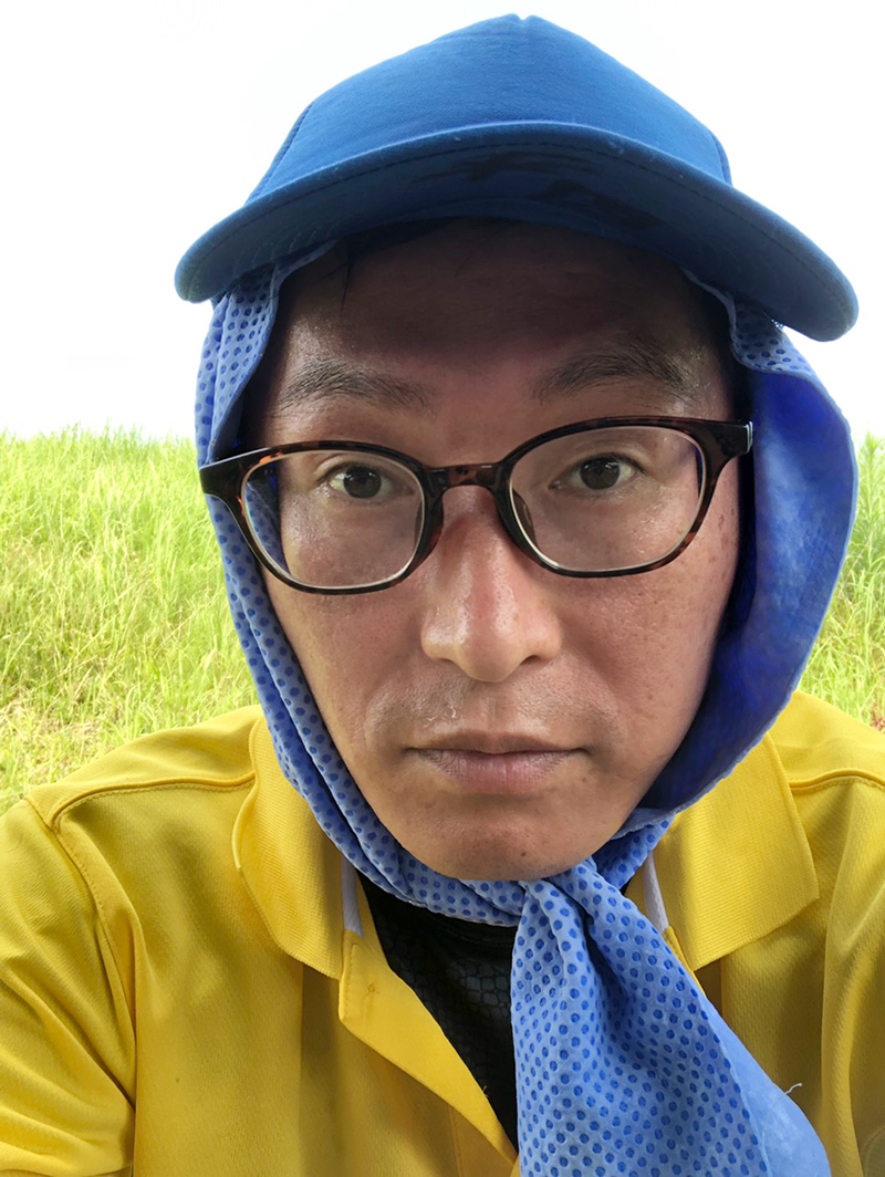 スタッフの岡本の写真