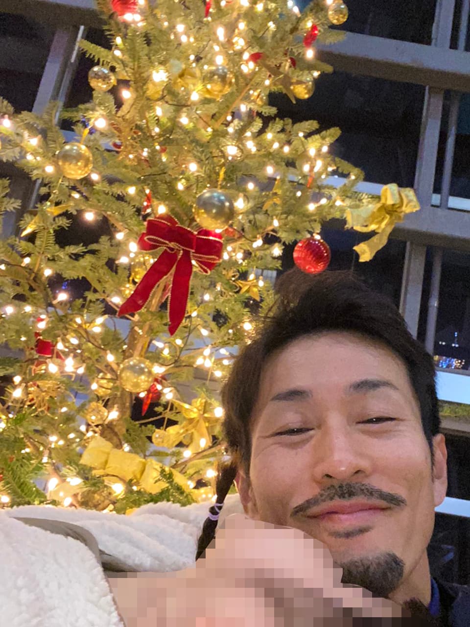 オシャレなツリーと中野の写真