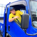 営業の高橋がトラックに乗っている画像