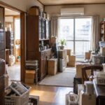 退去前で家具や荷物が多く残っている3Kの部屋